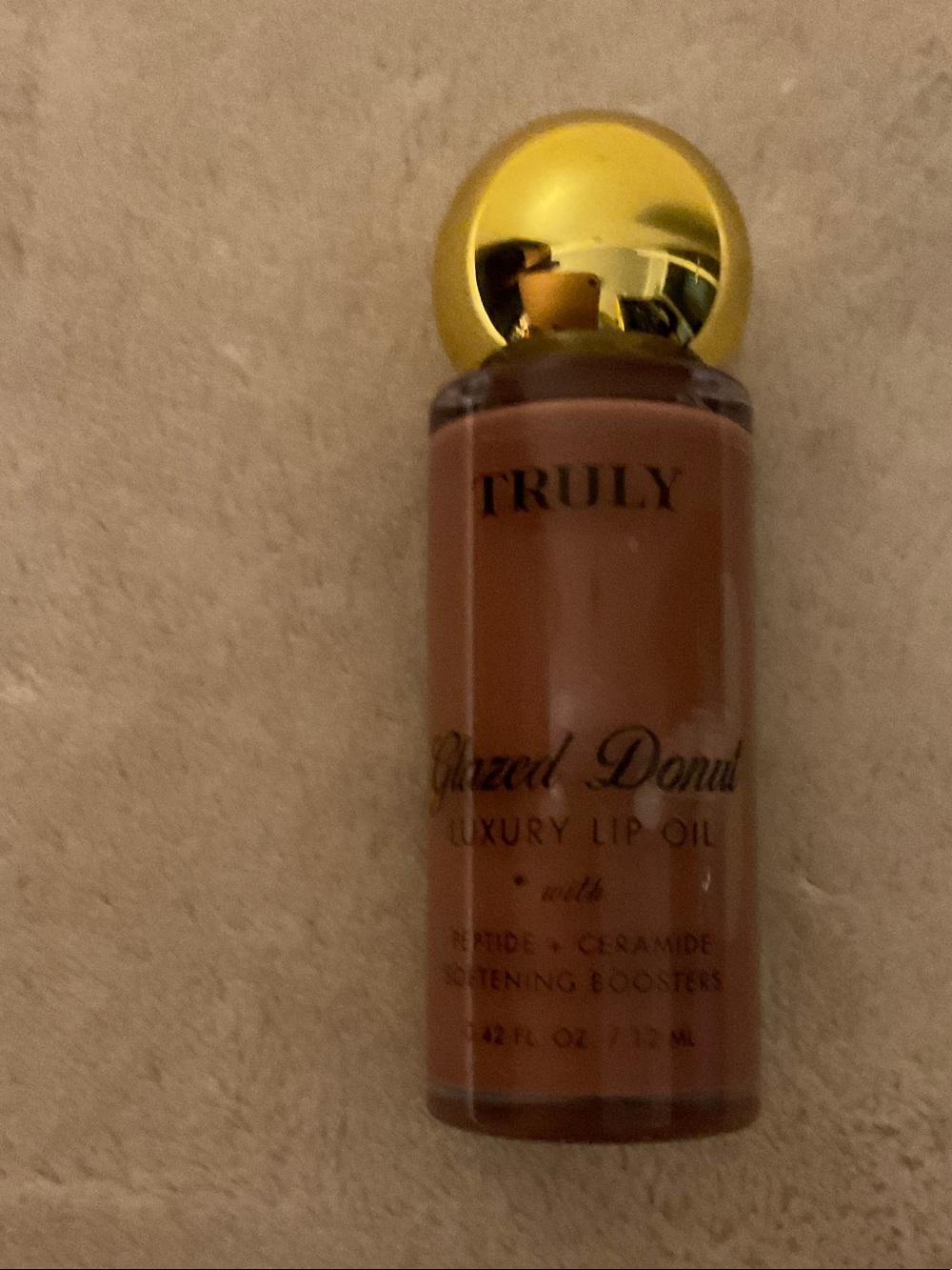 TRULY Glazed Donut Luxury Lip Oil — Brown with Gold Cap
